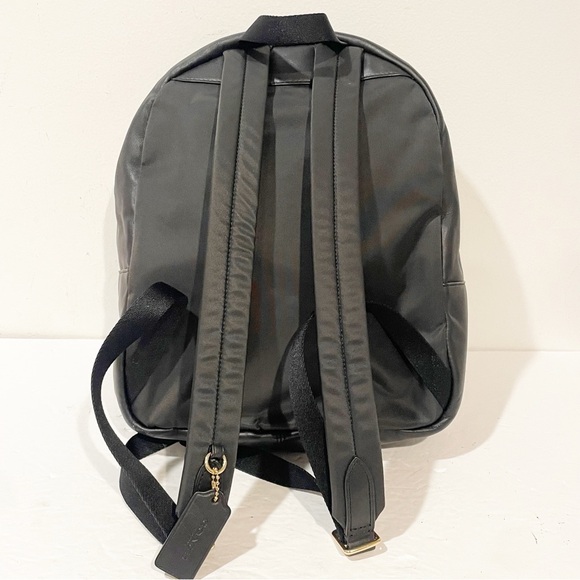 coach charlie signature brown black backpack Large Backpack In F58314 fabric lining Top handle with 2 drop Outside zip pocket Adjustable shoulder straps L28xH25xW10(CM) Coach Signature Charlie Backpack Beige/Brown